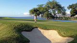 putting out on 11th hole at Mauna Kea Hawaii