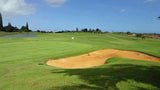 Puakea Golf Course 10th green with clubhouse in background