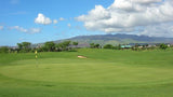 Coral Creek Golf course view of green and mountain