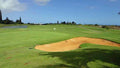 Puakea Golf Course 10th green with clubhouse in background
