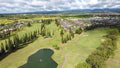 Aerial view of fairways and a pond at Waikele Country Club